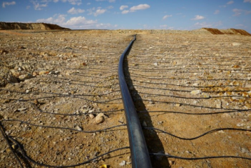 Поверхность отвала с оросительными линиями