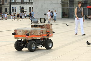 http://upload.wikimedia.org/wikipedia/commons/thumb/8/83/Justus_robot_in_Krakow_Poland_Aug2009.jpg/300px-Justus_robot_in_Krakow_Poland_Aug2009.jpg