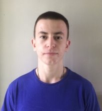 A person in a blue shirt

Description automatically generated