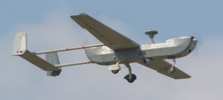 БЛА RQ-1 «Predator» (слева) и RQ-5 «Hanter» (справа)