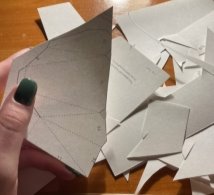 Вырезанные детали из чертёжной бумаги