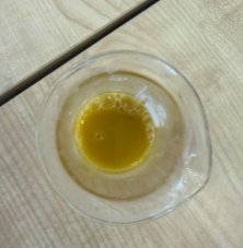 Вываривание цедры апельсинов в дистиллированной воде и отстаивание верхнего слоя жидкости с повышенным содержанием масла